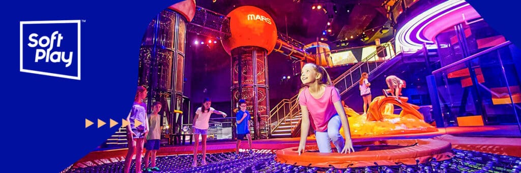 Children playing in an immersive play experience area