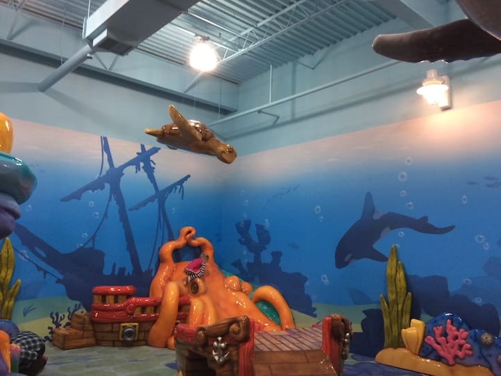 ocean animal soft sculptures in kids play area