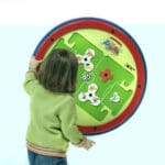 girl playing on soccer ball play panel